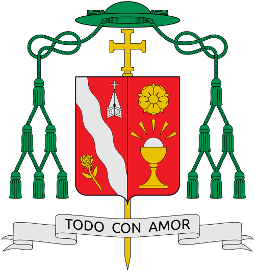 Coat of arms of the U.S. bishop James Anthony Tamayo, Bishop of Laredo. By heraldic tradition, the arms of the bishop or "ordinary" of a diocese are joined to the arms of his jurisdiction, seen in the left side of the shield. The Coat of Arms of the Diocese of Laredo captures the rich history of the Church in South Texas. The colors and symbols represent a diocese that treasures its history and looks joyfully to its future. Across the field, descending from upper left to lower right, is a wavy s