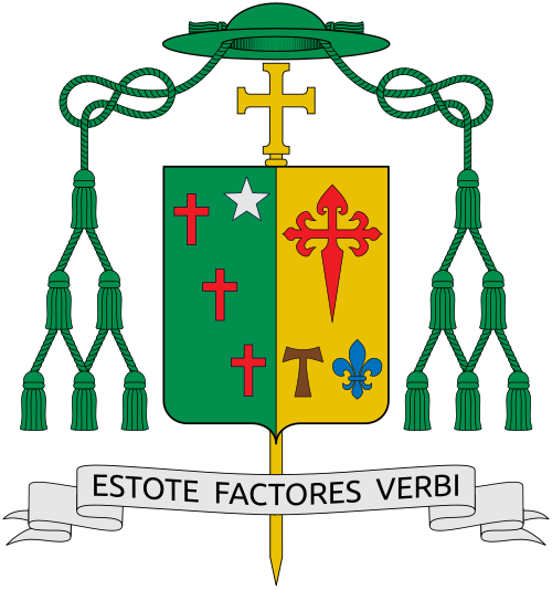 Coat of arms of the U.S. bishop James Sean Wall, Bishop of Gallup. The episcopal heraldic achievement (bishop's coat of arms) is composed of a shield—which is the central and most important part of the design—a scroll with a motto, and the external ornamentation. The design is described (blazoned) as if the description was being given by the bearer (from behind) with the shield being worn on the left arms. Thus, it must be remembered, where it applies, as the device is viewed from the front that